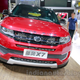 Illustration for article titled Chinese Debut Cheap Range Rover Copy At Display Next To The Real Thing